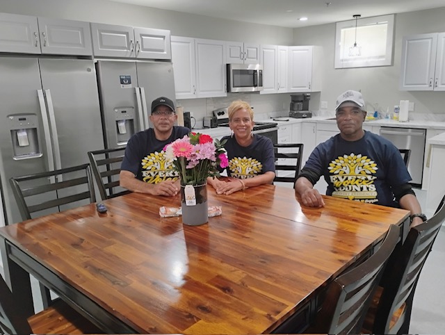 Bright furnished kitchen and dining common area at the recovery residence